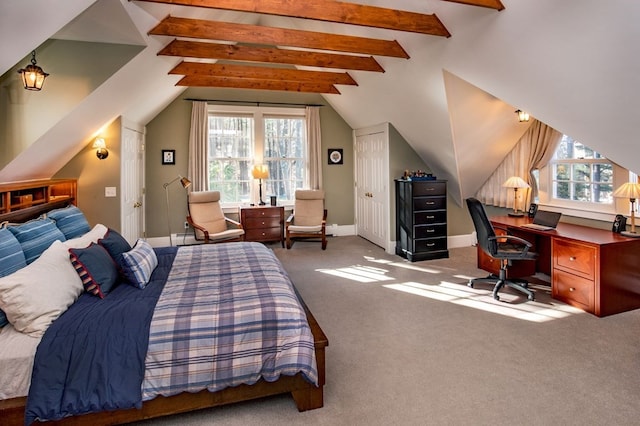 carpeted bedroom with lofted ceiling with beams