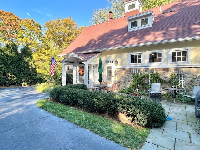 view of front of home featuring a patio