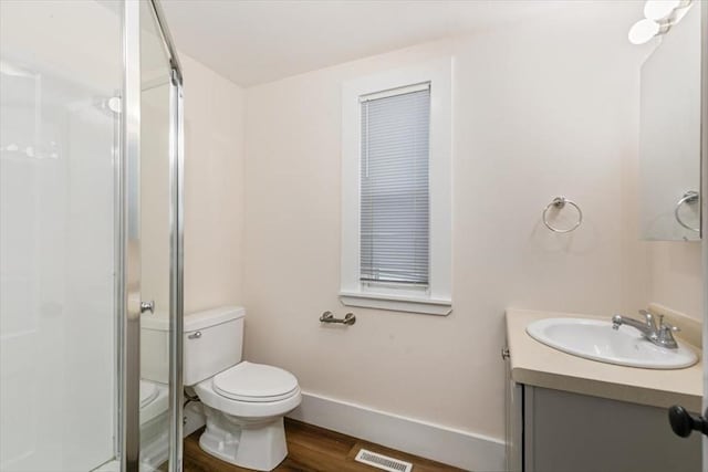 16 Rantoul St, Beverly, MA 01915 - full bath featuring vanity, wood finished floors, and a stall shower