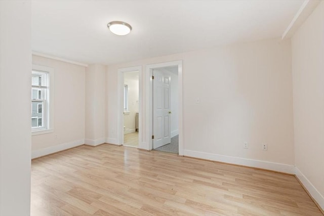 16 Rantoul St, Beverly, MA 01915 - spare room with light wood-type flooring and baseboards