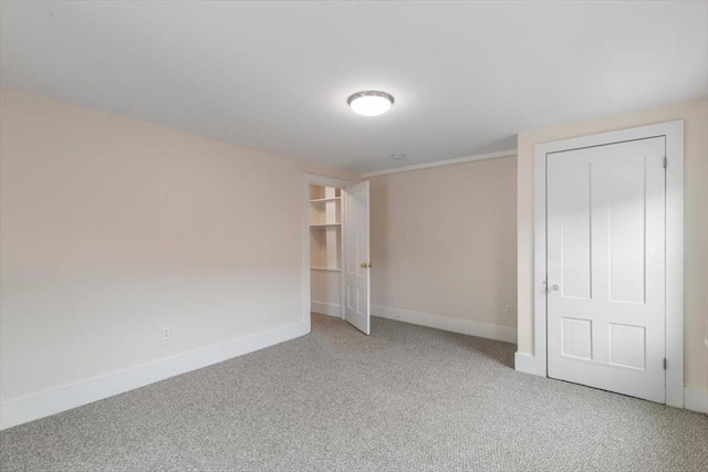 16 Rantoul St, Beverly, MA 01915 - unfurnished bedroom featuring light carpet and baseboards
