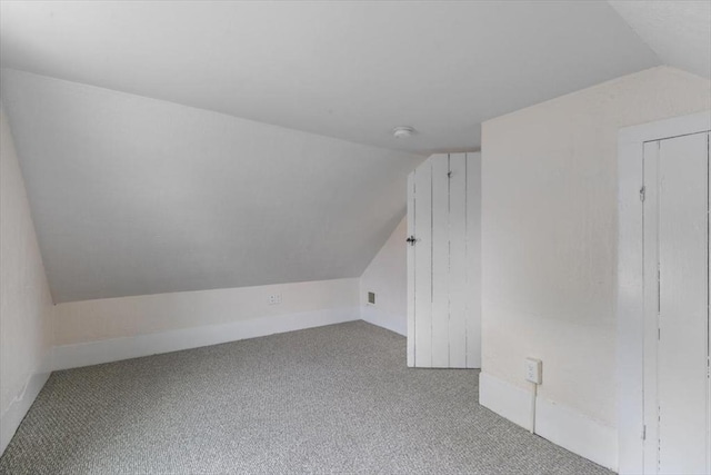 16 Rantoul St, Beverly, MA 01915 - additional living space with vaulted ceiling and carpet flooring