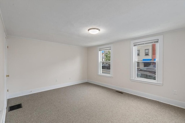 16 Rantoul St, Beverly, MA 01915 - unfurnished room with baseboards and carpet