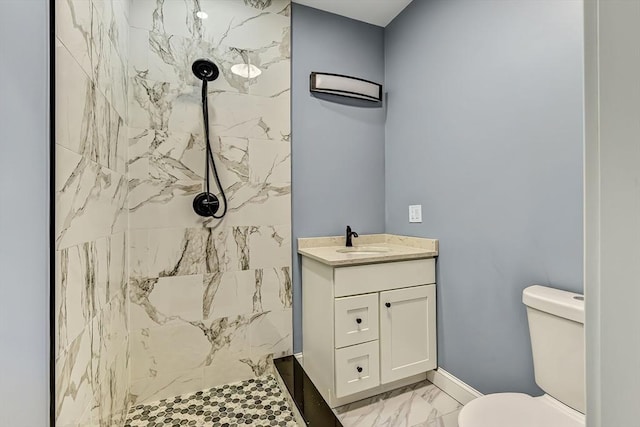 64 Clarkwood Unit 2, Boston, MA 02126 - full bath featuring marble look tile flooring, a marble finish shower, and vanity
