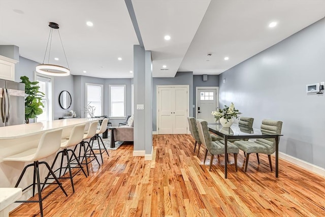 64 Clarkwood Unit 2, Boston, MA 02126 - dining space featuring light wood finished floors and recessed lighting