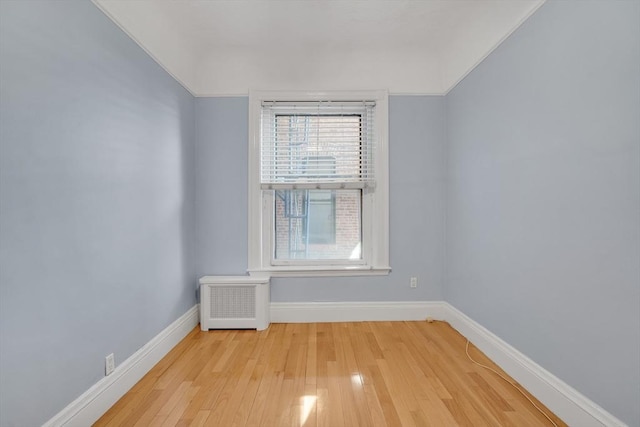 unfurnished room with light hardwood / wood-style flooring