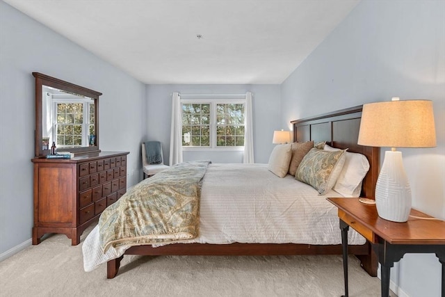 47 Blue Spruce Way Unit 47, Mashpee, MA 02649 - bedroom featuring multiple windows, light carpet, and baseboards