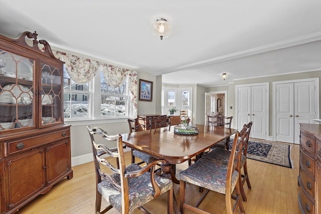 dining area with light hardwood / wood-style flooring