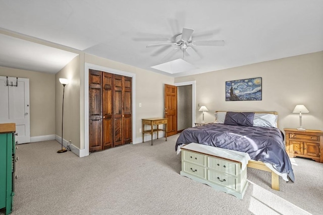 bedroom with light colored carpet and ceiling fan