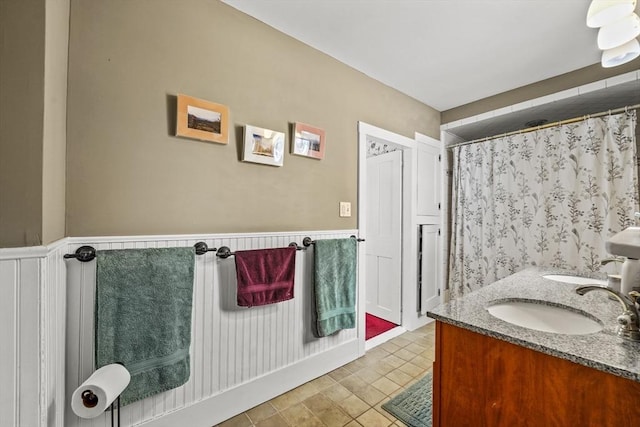 bathroom featuring vanity and walk in shower