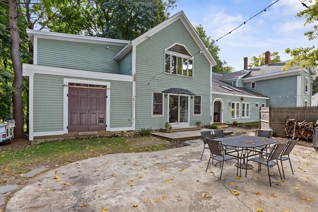 rear view of house with a patio area