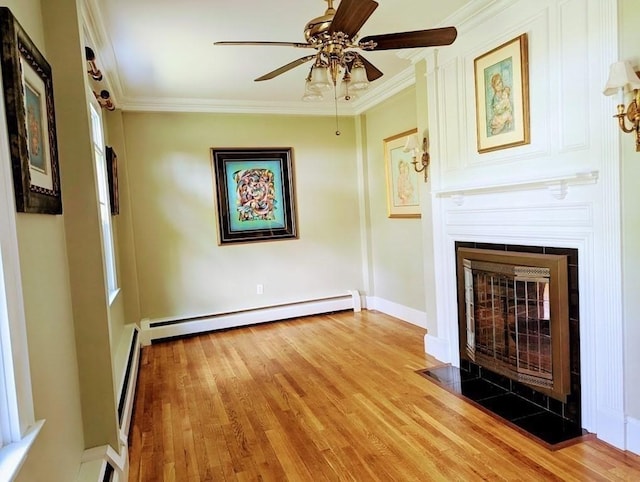 43 Brunswick Rd, Arlington, MA 02474 - unfurnished living room featuring crown molding, a fireplace with flush hearth, a baseboard radiator, and ceiling fan