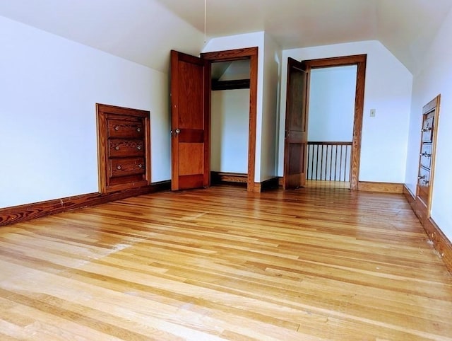 43 Brunswick Rd, Arlington, MA 02474 - bonus room with baseboards, lofted ceiling, and light wood-style floors