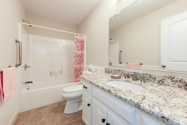 full bathroom featuring toilet, shower / bath combination with curtain, vanity, and tile patterned flooring