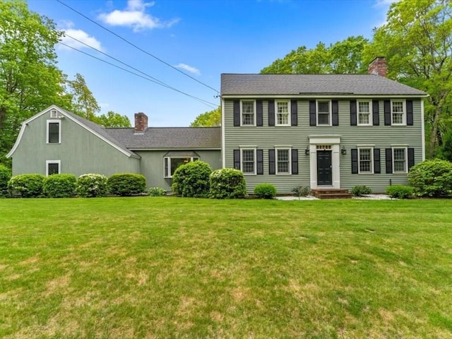 157 Harvard Rd, Bolton, MA 01740 - colonial house with a chimney, a front yard, and a shingled roof