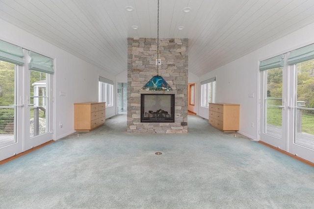 9 Beetlebung Grove Way, Chilmark, MA 02535 - unfurnished living room featuring a stone fireplace, wooden ceiling, healthy amount of natural light, carpet, and lofted ceiling