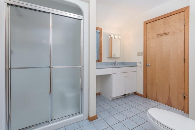 9 Beetlebung Grove Way, Chilmark, MA 02535 - bathroom with vanity, a shower stall, toilet, tile patterned floors, and baseboards