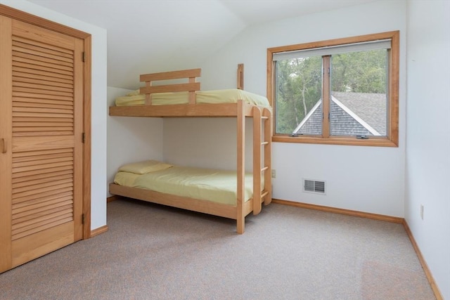 9 Beetlebung Grove Way, Chilmark, MA 02535 - carpeted bedroom with vaulted ceiling and baseboards