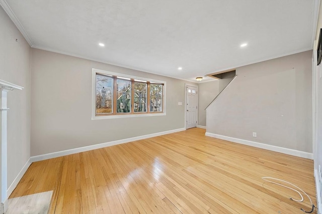 interior space featuring light hardwood / wood-style floors and ornamental molding