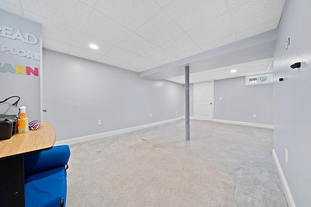 basement featuring a drop ceiling