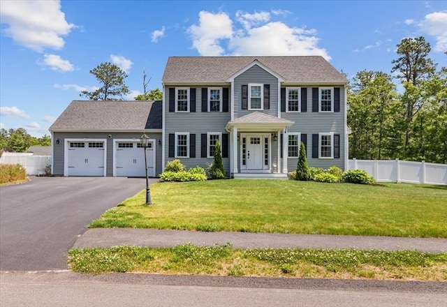 0 Thompson St, Middleboro, MA 02346 - colonial house featuring a garage and asphalt driveway