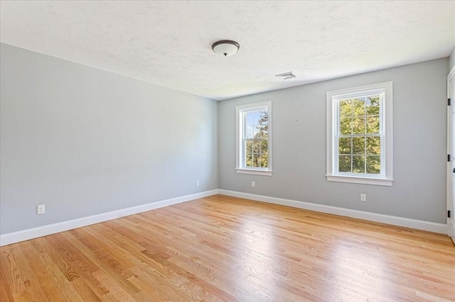 0 Thompson St, Middleboro, MA 02346 - unfurnished room featuring light wood finished floors and a textured ceiling