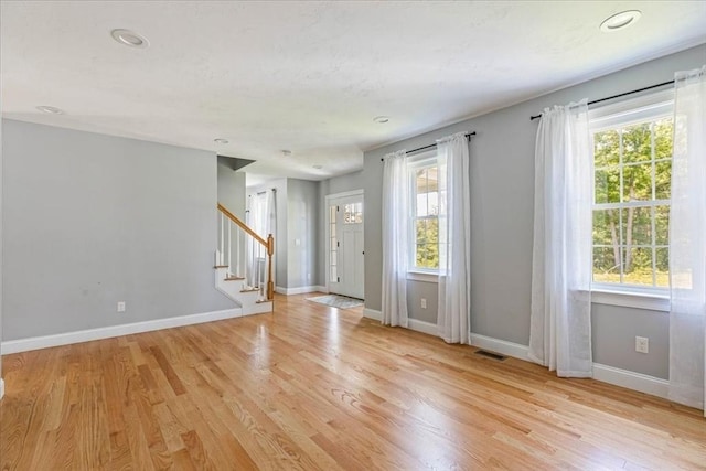 0 Thompson St, Middleboro, MA 02346 - entrance foyer featuring stairway, light wood-type flooring, and recessed lighting