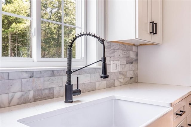 0 Thompson St, Middleboro, MA 02346 - kitchen view of backsplash, white cabinetry, and light stone counters