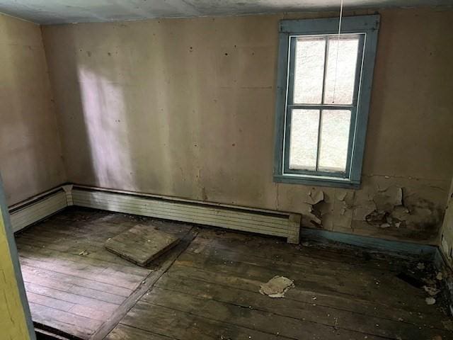 empty room featuring dark hardwood / wood-style floors