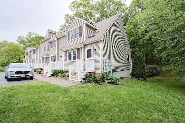 8 Heritage Dr Unit 8, Medway, MA 02053 - view of front facade with a front lawn and a shingled roof