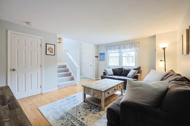 8 Heritage Dr Unit 8, Medway, MA 02053 - living area with light wood-style floors, stairs, and baseboards