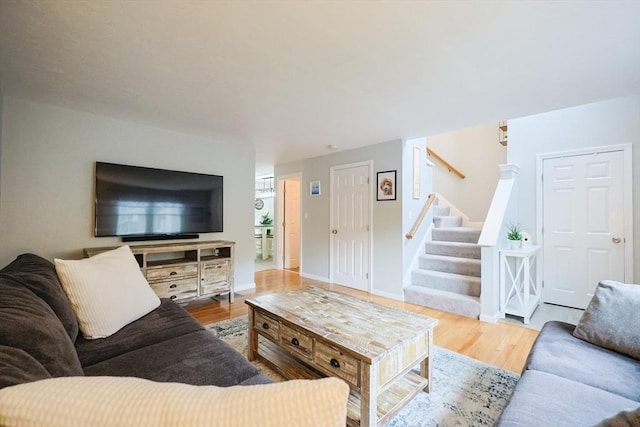 8 Heritage Dr Unit 8, Medway, MA 02053 - living area featuring stairway and wood finished floors