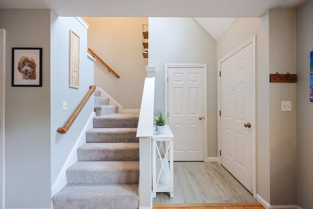 8 Heritage Dr Unit 8, Medway, MA 02053 - staircase with wood finished floors and baseboards