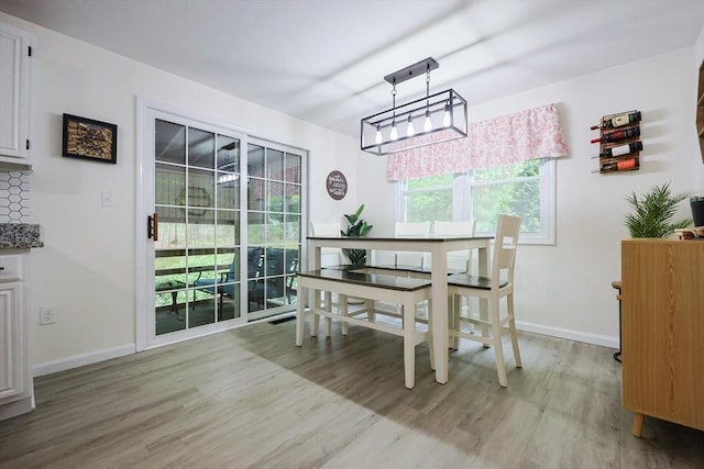 8 Heritage Dr Unit 8, Medway, MA 02053 - dining room with light wood-type flooring and baseboards