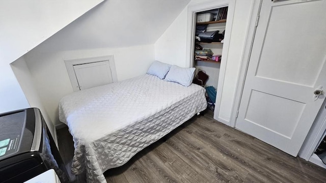 35 Neponset St, Revere, MA 02151 - bedroom featuring a closet, vaulted ceiling, and wood finished floors