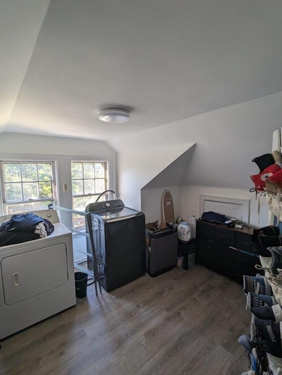 35 Neponset St, Revere, MA 02151 - additional living space with independent washer and dryer, wood finished floors, and lofted ceiling