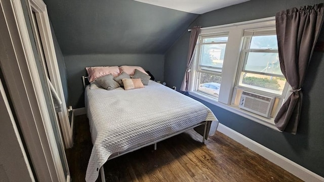 35 Neponset St, Revere, MA 02151 - bedroom with cooling unit, wood finished floors, baseboards, and lofted ceiling