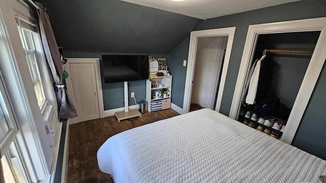 35 Neponset St, Revere, MA 02151 - bedroom with dark wood-style flooring, baseboards, and vaulted ceiling
