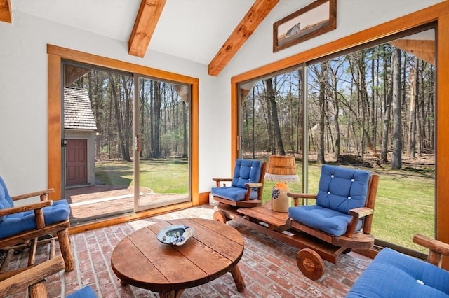 sunroom / solarium with beamed ceiling