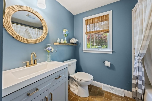 111 Richardson Rd, Barnstable, MA 02632 - full bath featuring baseboards, toilet, vanity, and a shower with shower curtain