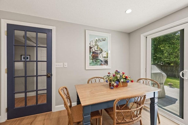111 Richardson Rd, Barnstable, MA 02632 - dining space with wood finished floors, recessed lighting, baseboards, and a textured ceiling