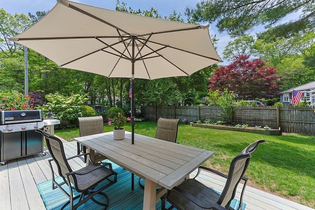 111 Richardson Rd, Barnstable, MA 02632 - wooden deck with outdoor dining area and a grill