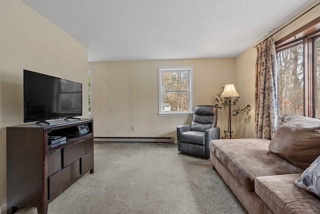 carpeted living room featuring a textured ceiling and baseboard heating