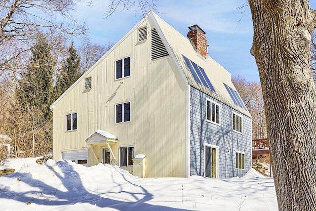 exterior space featuring a chimney