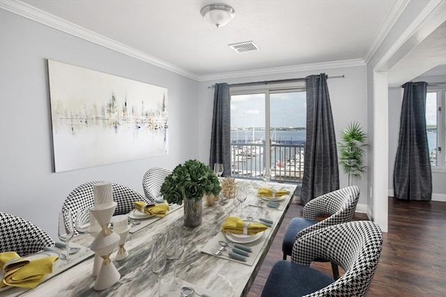 700 Shore Dr Unit 1106, Fall River, MA 02721 - dining area with ornamental molding, healthy amount of natural light, wood finished floors, and a water view