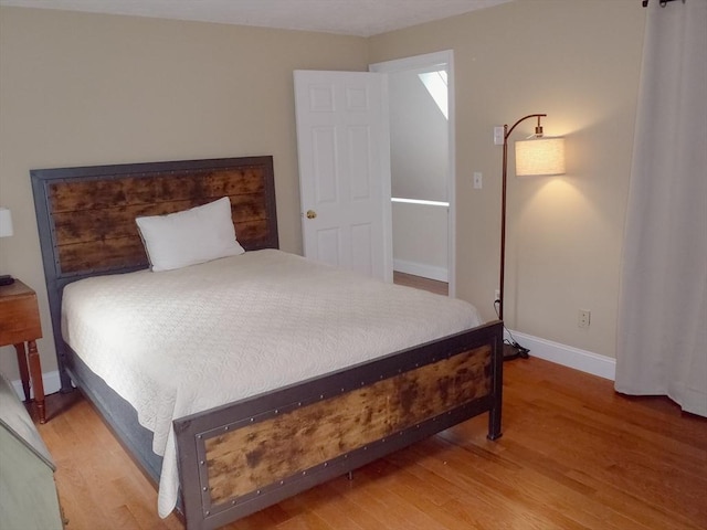 bedroom featuring hardwood / wood-style floors