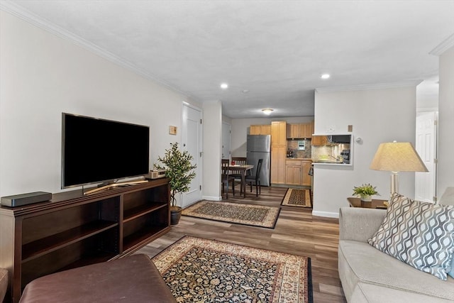 358 Broadway Unit 20, Lynn, MA 01904 - living room with crown molding, wood finished floors, baseboards, and recessed lighting