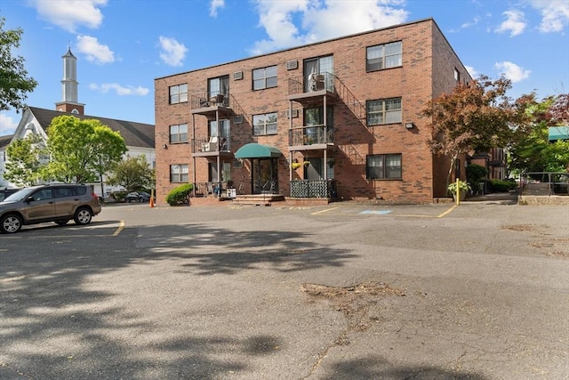 358 Broadway Unit 20, Lynn, MA 01904 - view of building exterior featuring uncovered parking