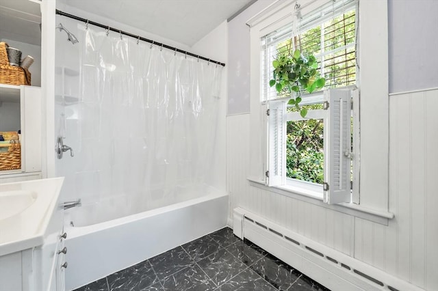 4 3rd Rd, Woburn, MA 01801 - full bathroom with a baseboard heating unit, marble look tiles, wainscoting, shower / bath combo with shower curtain, and plenty of natural light