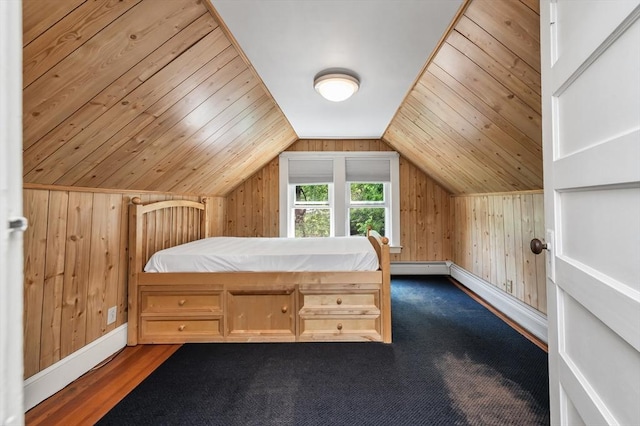 4 3rd Rd, Woburn, MA 01801 - bedroom with wooden walls, vaulted ceiling, dark wood finished floors, and baseboard heating